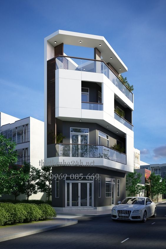 Sự kết hợp giữa ban công kính cường lực và không gian xanh làm cho thiết kế trở nên hiện đại và xanh mát 